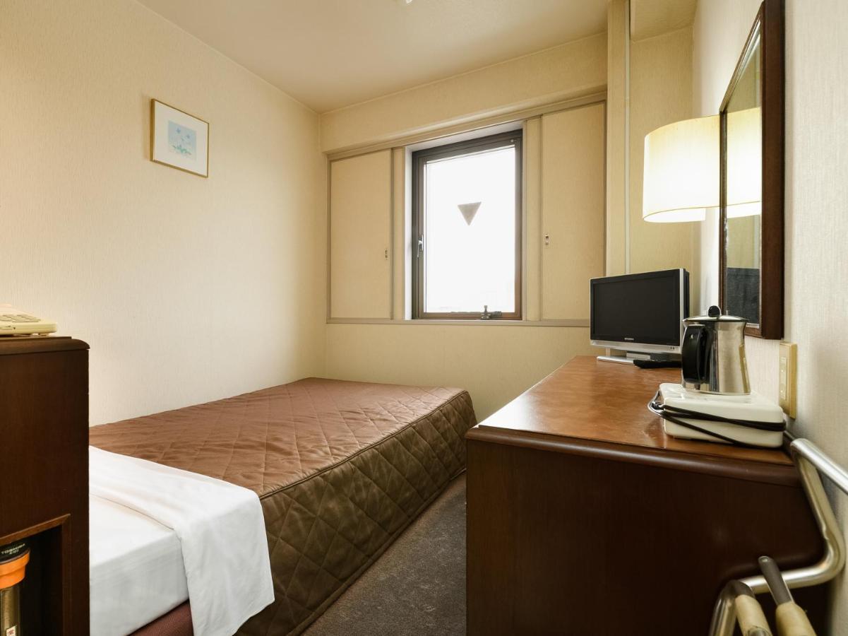 Tabist Kameyama Daiichi Hotel Esterno foto